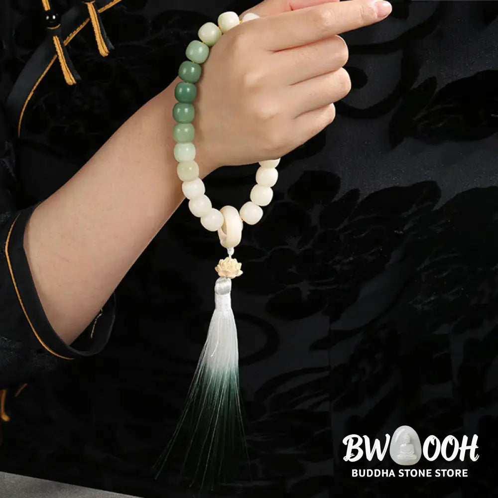 BWOOOH Natural Gradient Bodhi Seed Fortune Money Bag Lotus Wisdom Tassel Wrist Mala featuring 12mm dark-speckled bodhi seeds, boxwood, agate, and green aventurine; a handcrafted spiritual meditation bracelet for wisdom and calm. - View 15