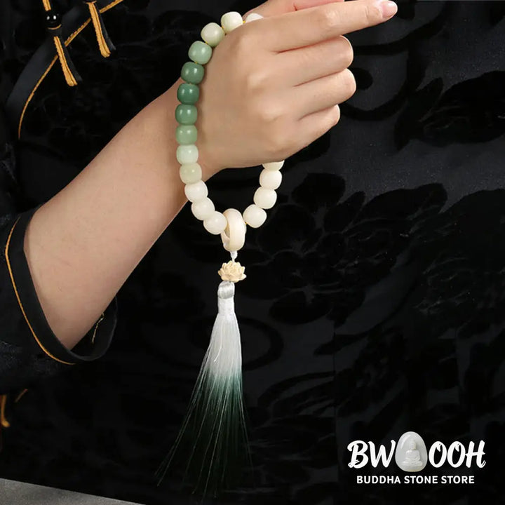 BWOOOH Natural Gradient Bodhi Seed Fortune Money Bag Lotus Wisdom Tassel Wrist Mala featuring 12mm dark-speckled bodhi seeds, boxwood, agate, and green aventurine; a handcrafted spiritual meditation bracelet for wisdom and calm. - View 15