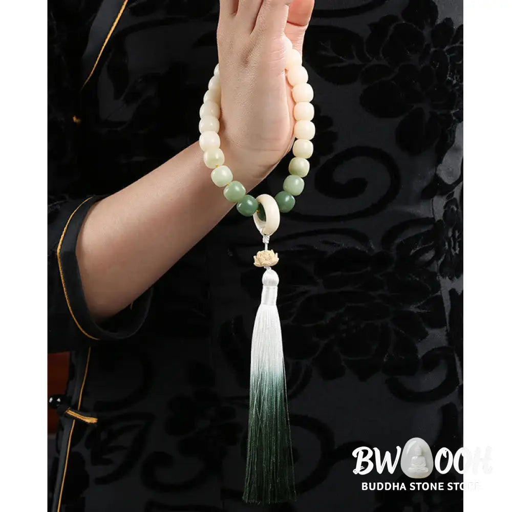 BWOOOH Natural Gradient Bodhi Seed Fortune Money Bag Lotus Wisdom Tassel Wrist Mala featuring 12mm dark-speckled bodhi seeds, boxwood, agate, and green aventurine; a handcrafted spiritual meditation bracelet for wisdom and calm. - View 18