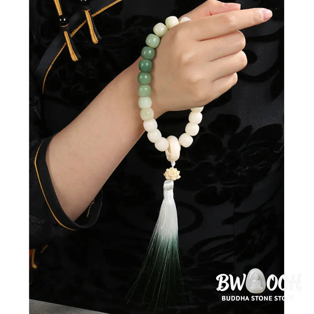 BWOOOH Natural Gradient Bodhi Seed Fortune Money Bag Lotus Wisdom Tassel Wrist Mala featuring 12mm dark-speckled bodhi seeds, boxwood, agate, and green aventurine; a handcrafted spiritual meditation bracelet for wisdom and calm. - View 17
