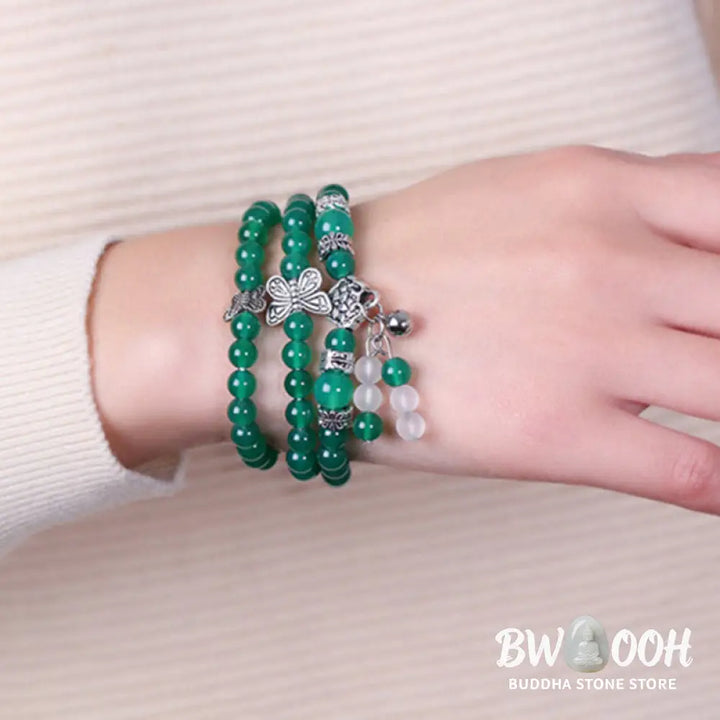 BWOOOH Natural Green Agate Butterfly Support Bracelet featuring 6mm green agate beads and a delicate copper alloy butterfly charm on elastic string, symbolizing transformation, courage, and spiritual balance. - View 5