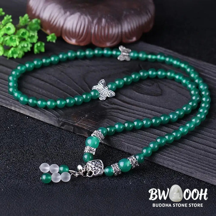 BWOOOH Natural Green Agate Butterfly Support Bracelet featuring 6mm green agate beads and a delicate copper alloy butterfly charm on elastic string, symbolizing transformation, courage, and spiritual balance. - View 4