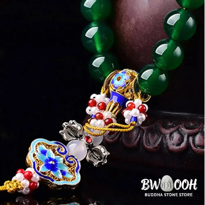 Close-up of BWOOOH Natural Green Agate Wrist Mala, showcasing polished green 10mm, 12mm, 14mm beads on premium elastic string. Designed as a success charm, pocket mala, and car decoration for courage and manifestation during mindfulness practices. - View 7