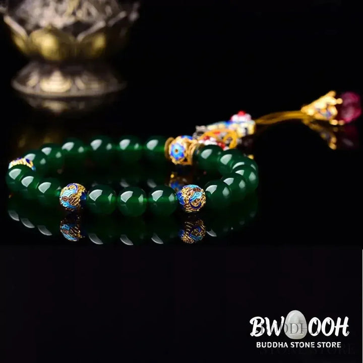 Close-up of BWOOOH Natural Green Agate Wrist Mala, showcasing polished green 10mm, 12mm, 14mm beads on premium elastic string. Designed as a success charm, pocket mala, and car decoration for courage and manifestation during mindfulness practices. - View 5