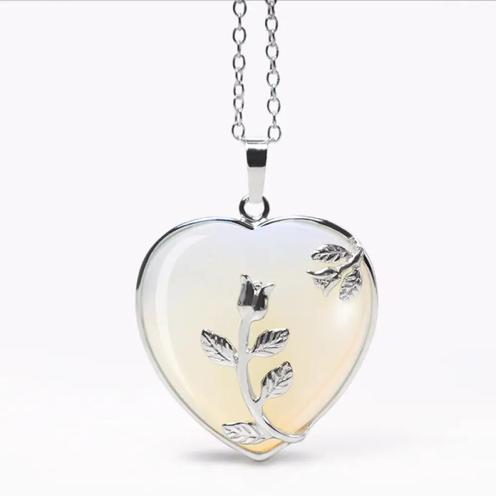 BWOOOH Natural Healing Crystals Heart Pendant Necklace, showcasing polished Amethyst, Pink Crystal, Australian Opal, and Clear Quartz. Handcrafted 1.3x1.4 inch heart for spiritual balance, meditation, and stress relief. - View 8
