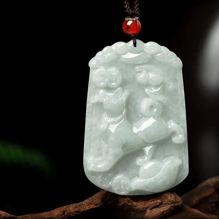 A BWOOOH Natural Jade 12 Chinese Zodiac Abundance Amulet Pendant Necklace, featuring intricate carvings of animals like the Dragon and Tiger, symbolizing prosperity and spiritual balance. The jade stone is polished, reflecting light and emphasizing its natural beauty. - View 24