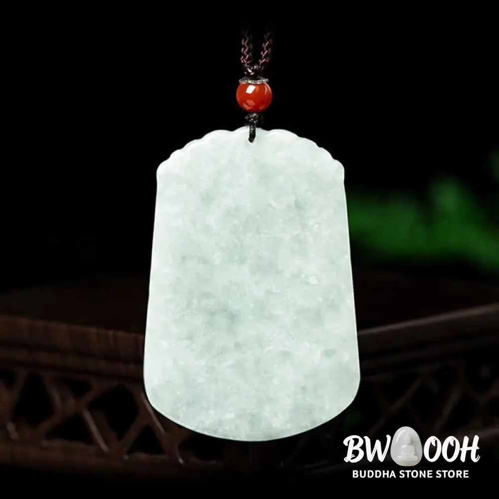 A BWOOOH Natural Jade 12 Chinese Zodiac Abundance Amulet Pendant Necklace, featuring intricate carvings of animals like the Dragon and Tiger, symbolizing prosperity and spiritual balance. The jade stone is polished, reflecting light and emphasizing its natural beauty. - View 2