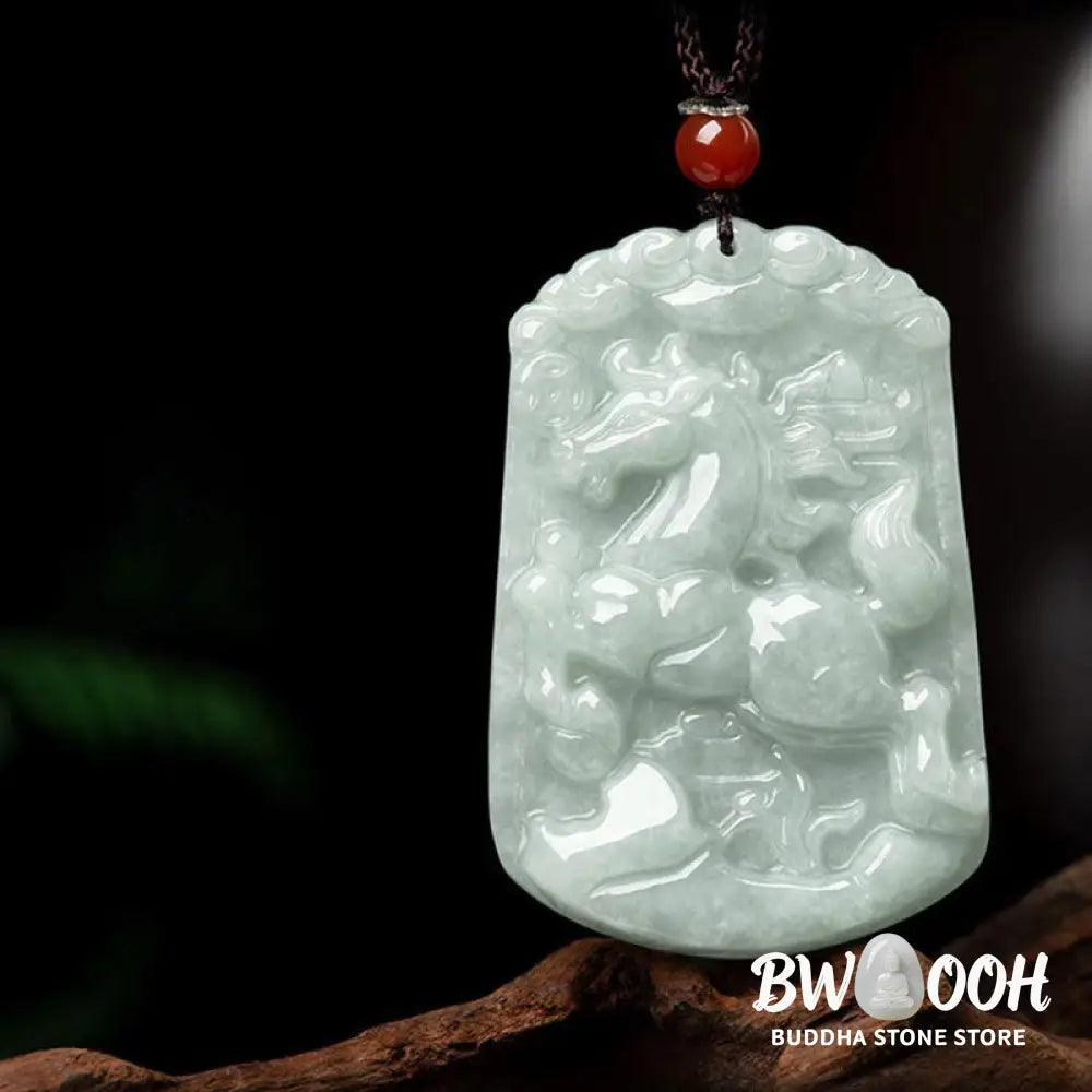 A BWOOOH Natural Jade 12 Chinese Zodiac Abundance Amulet Pendant Necklace, featuring intricate carvings of animals like the Dragon and Tiger, symbolizing prosperity and spiritual balance. The jade stone is polished, reflecting light and emphasizing its natural beauty. - View 8