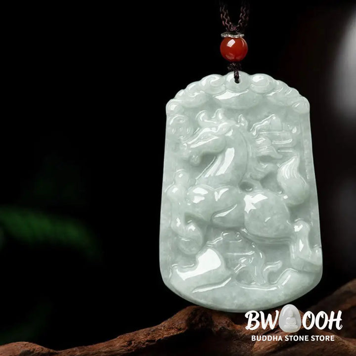A BWOOOH Natural Jade 12 Chinese Zodiac Abundance Amulet Pendant Necklace, featuring intricate carvings of animals like the Dragon and Tiger, symbolizing prosperity and spiritual balance. The jade stone is polished, reflecting light and emphasizing its natural beauty. - View 8