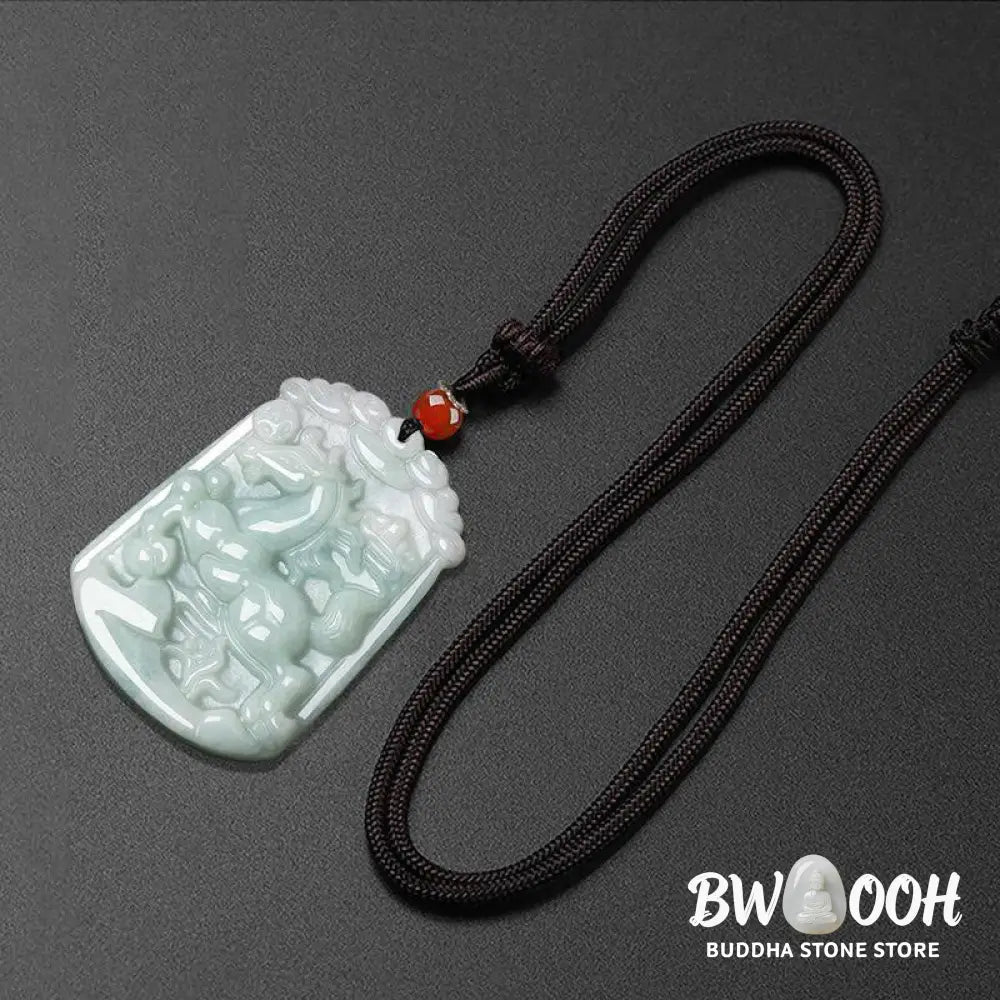 A BWOOOH Natural Jade 12 Chinese Zodiac Abundance Amulet Pendant Necklace, featuring intricate carvings of animals like the Dragon and Tiger, symbolizing prosperity and spiritual balance. The jade stone is polished, reflecting light and emphasizing its natural beauty. - View 20