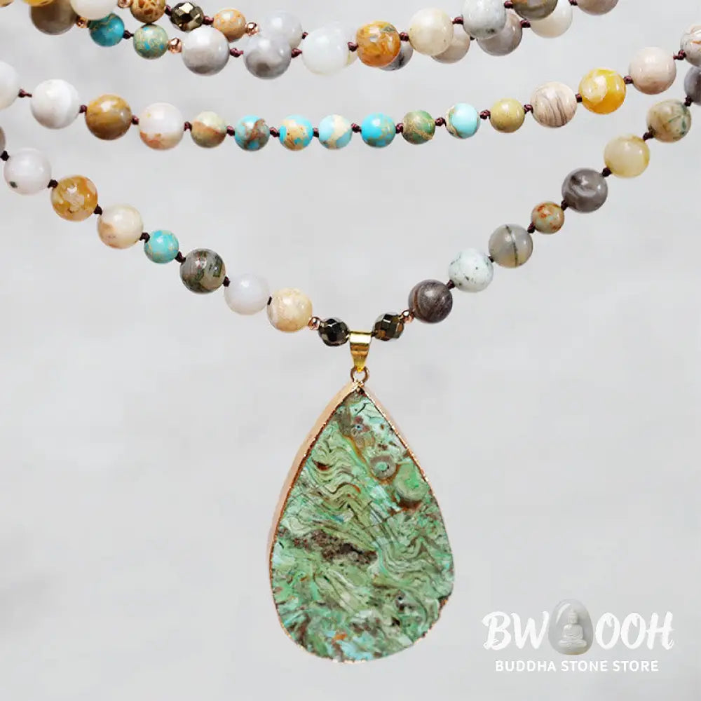 A close-up of the BWOOOH Natural Ocean Picasso Jasper Beaded Healing Necklace, 33.5 inches long, showcasing unique patterns of sea sediment, picture, and Picasso jasper stones. Unisex design. - View 2