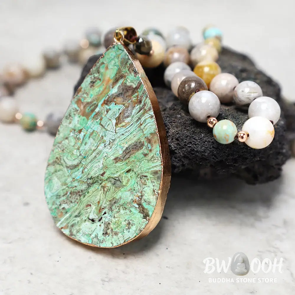 A close-up of the BWOOOH Natural Ocean Picasso Jasper Beaded Healing Necklace, 33.5 inches long, showcasing unique patterns of sea sediment, picture, and Picasso jasper stones. Unisex design. - View 4