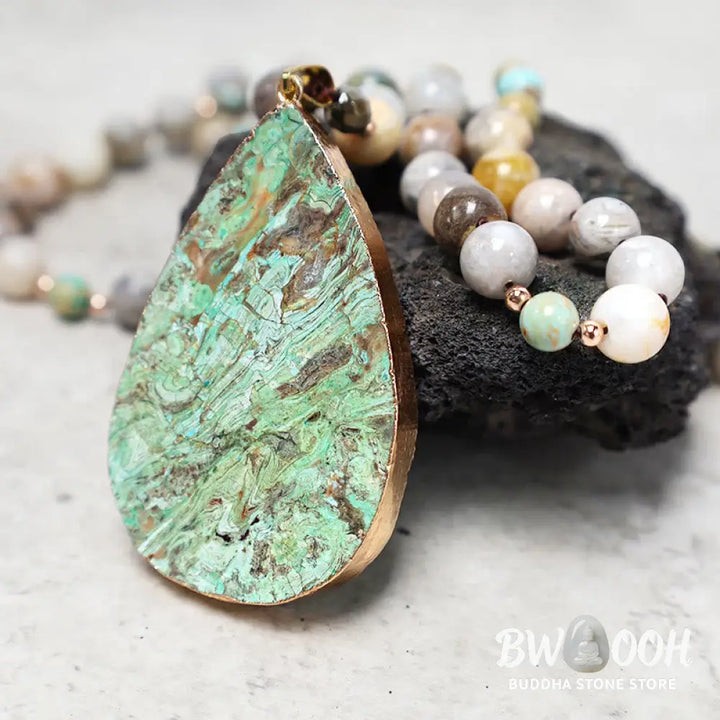 A close-up of the BWOOOH Natural Ocean Picasso Jasper Beaded Healing Necklace, 33.5 inches long, showcasing unique patterns of sea sediment, picture, and Picasso jasper stones. Unisex design. - View 4