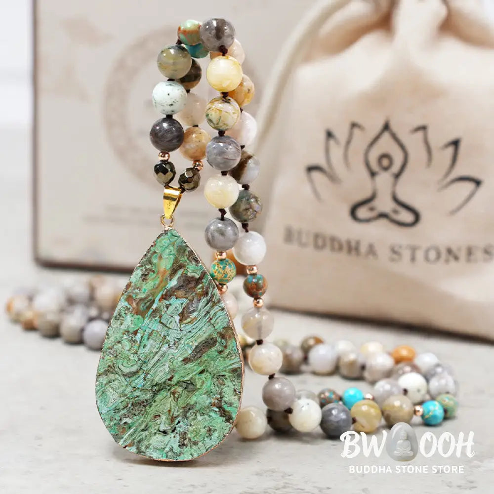 A close-up of the BWOOOH Natural Ocean Picasso Jasper Beaded Healing Necklace, 33.5 inches long, showcasing unique patterns of sea sediment, picture, and Picasso jasper stones. Unisex design. - View 9