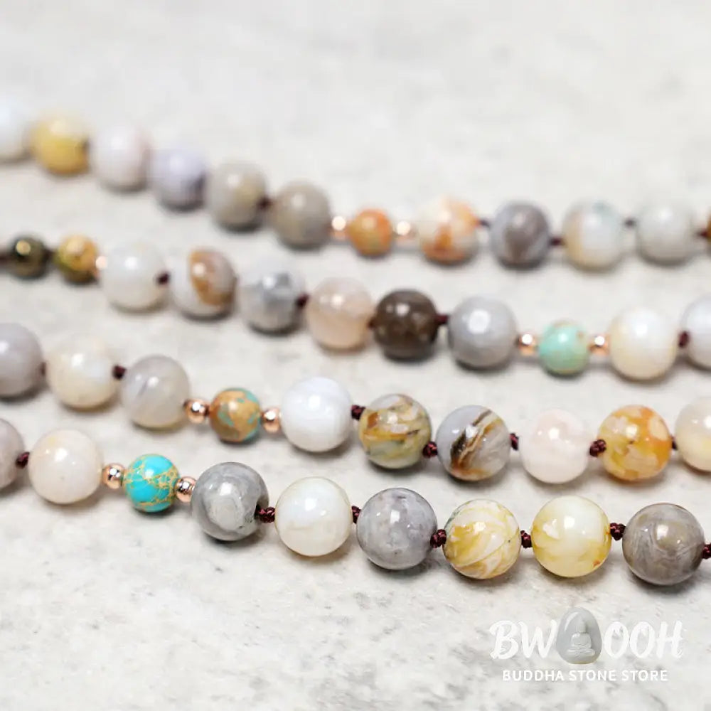 A close-up of the BWOOOH Natural Ocean Picasso Jasper Beaded Healing Necklace, 33.5 inches long, showcasing unique patterns of sea sediment, picture, and Picasso jasper stones. Unisex design. - View 7