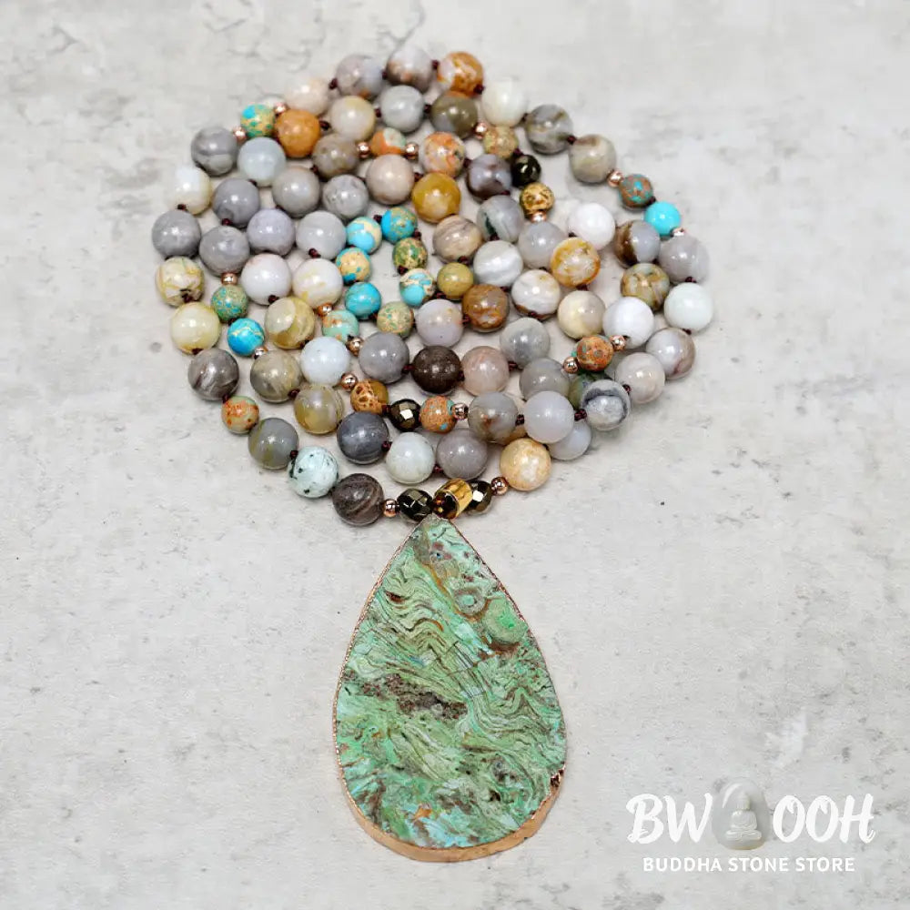 A close-up of the BWOOOH Natural Ocean Picasso Jasper Beaded Healing Necklace, 33.5 inches long, showcasing unique patterns of sea sediment, picture, and Picasso jasper stones. Unisex design. - View 8