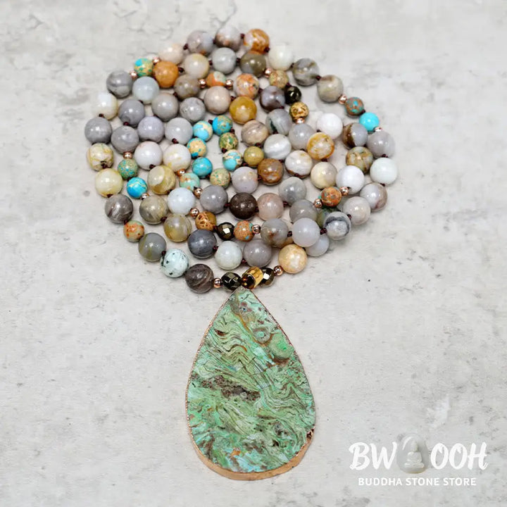 A close-up of the BWOOOH Natural Ocean Picasso Jasper Beaded Healing Necklace, 33.5 inches long, showcasing unique patterns of sea sediment, picture, and Picasso jasper stones. Unisex design. - View 8