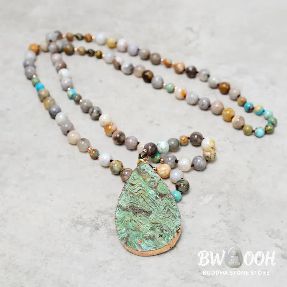 A close-up of the BWOOOH Natural Ocean Picasso Jasper Beaded Healing Necklace, 33.5 inches long, showcasing unique patterns of sea sediment, picture, and Picasso jasper stones. Unisex design. - View 6
