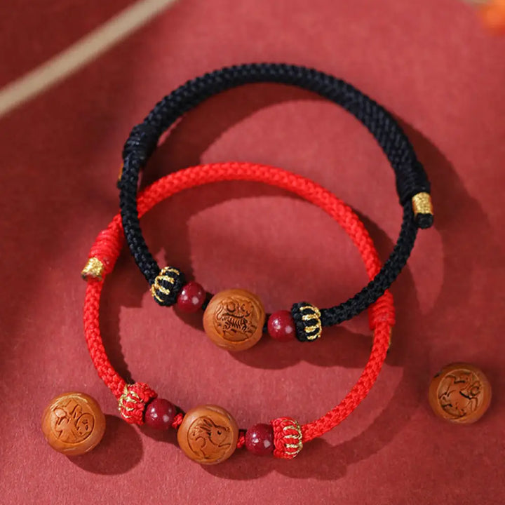 BWOOOH Natural Peach Wood Chinese Zodiac Fu Character Carved Cinnabar Wealth Bracelet | spiritual healing bracelet
