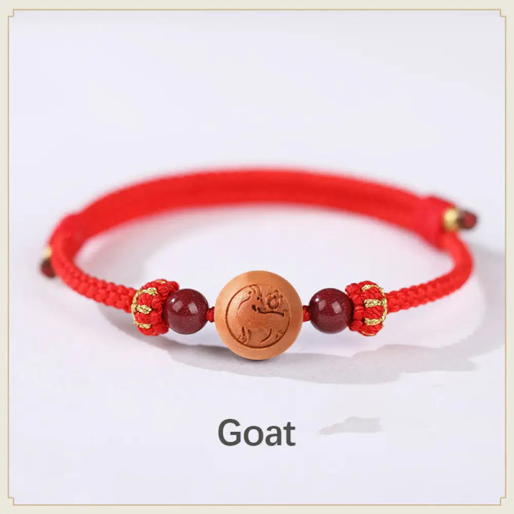 BWOOOH Natural Peach Wood Chinese Zodiac Fu Character Carved Cinnabar Wealth Bracelet - Goat-Red(Wrist