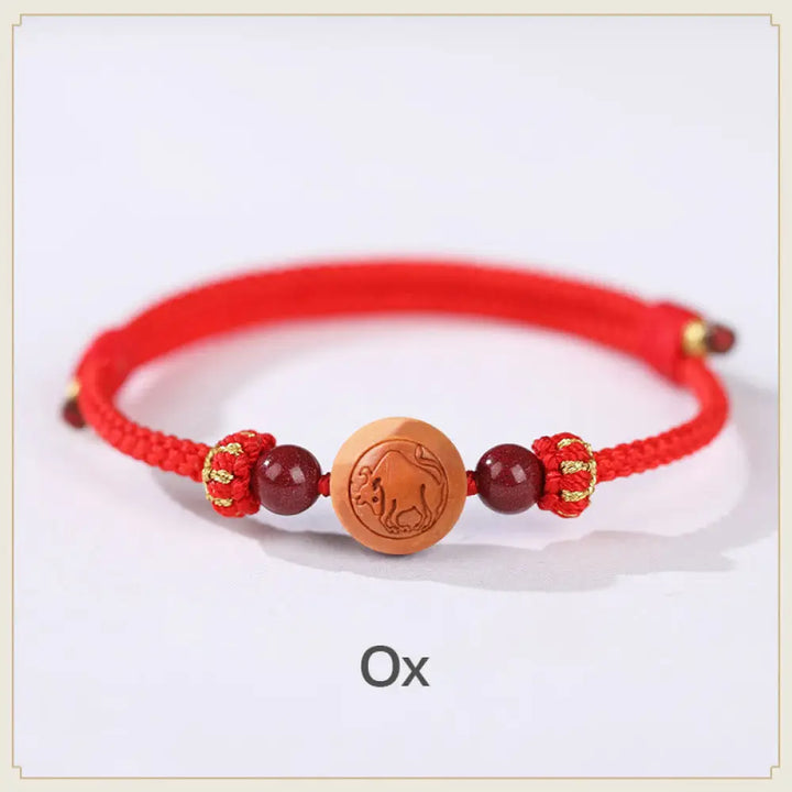 BWOOOH Natural Peach Wood Chinese Zodiac Fu Character Carved Cinnabar Wealth Bracelet - Ox-Red(Wrist