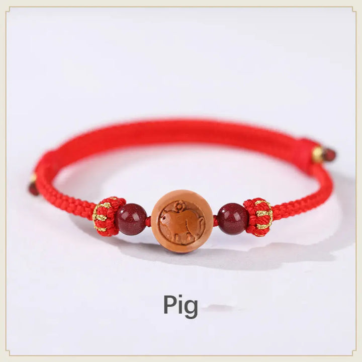 BWOOOH Natural Peach Wood Chinese Zodiac Fu Character Carved Cinnabar Wealth Bracelet - Pig-Red(Wrist