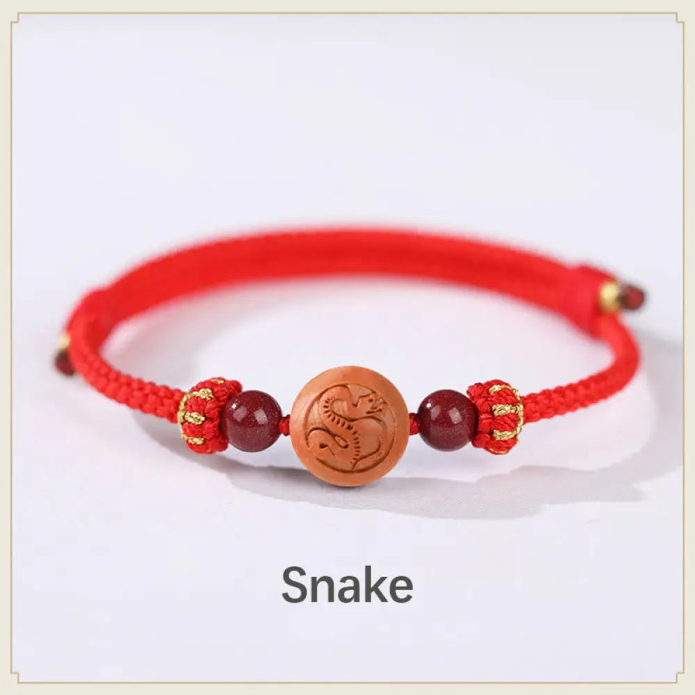 BWOOOH Natural Peach Wood Chinese Zodiac Fu Character Carved Cinnabar Wealth Bracelet - Snake-Red(Wrist