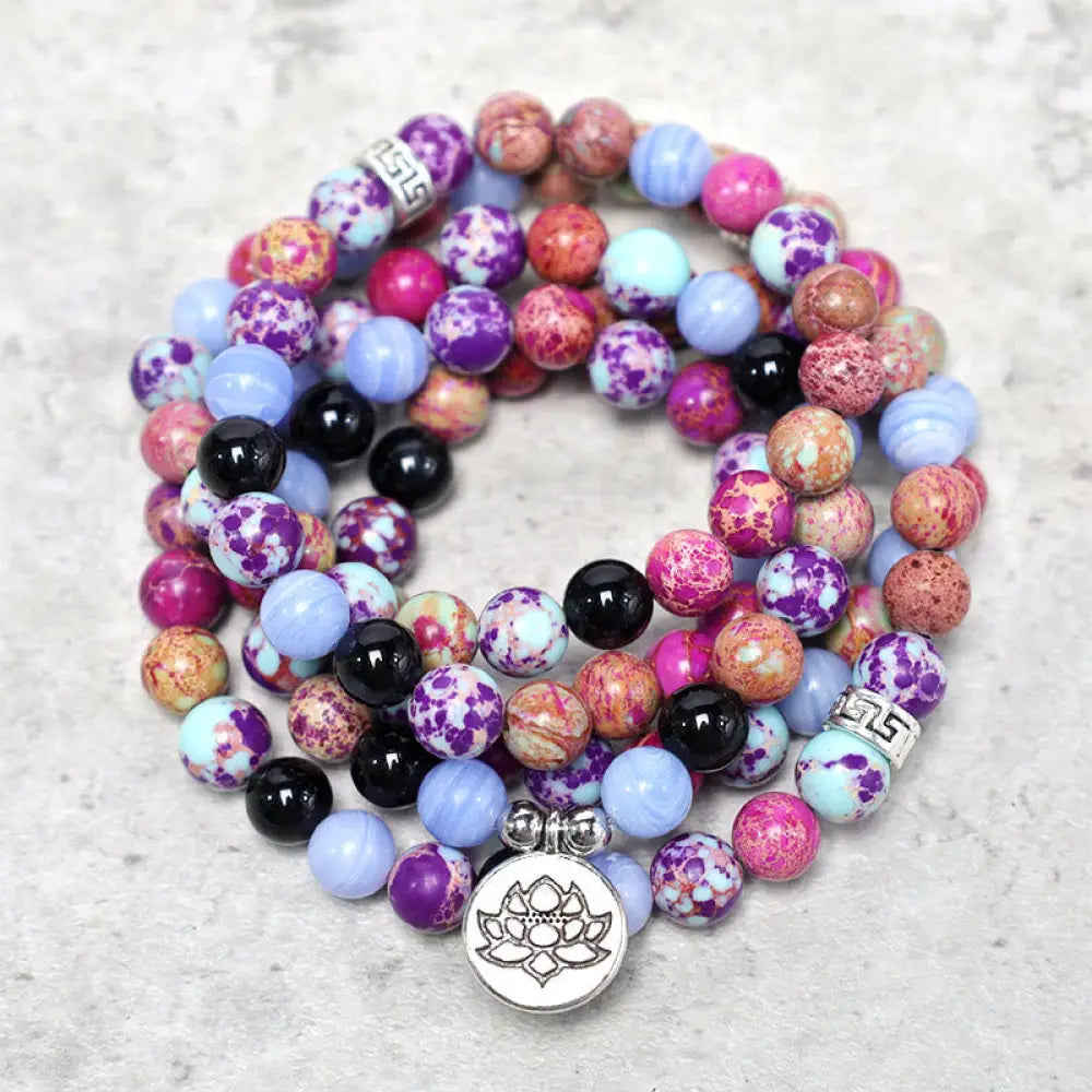 A BWOOOH Natural Purple Miano Real Stone Lotus Mala featuring 108 polished 8mm purple beads, a detailed Lotus symbol charm, and a guru bead, designed for mindful meditation and spiritual balance. The mala is 37 inches long, handcrafted for unisex wear.
