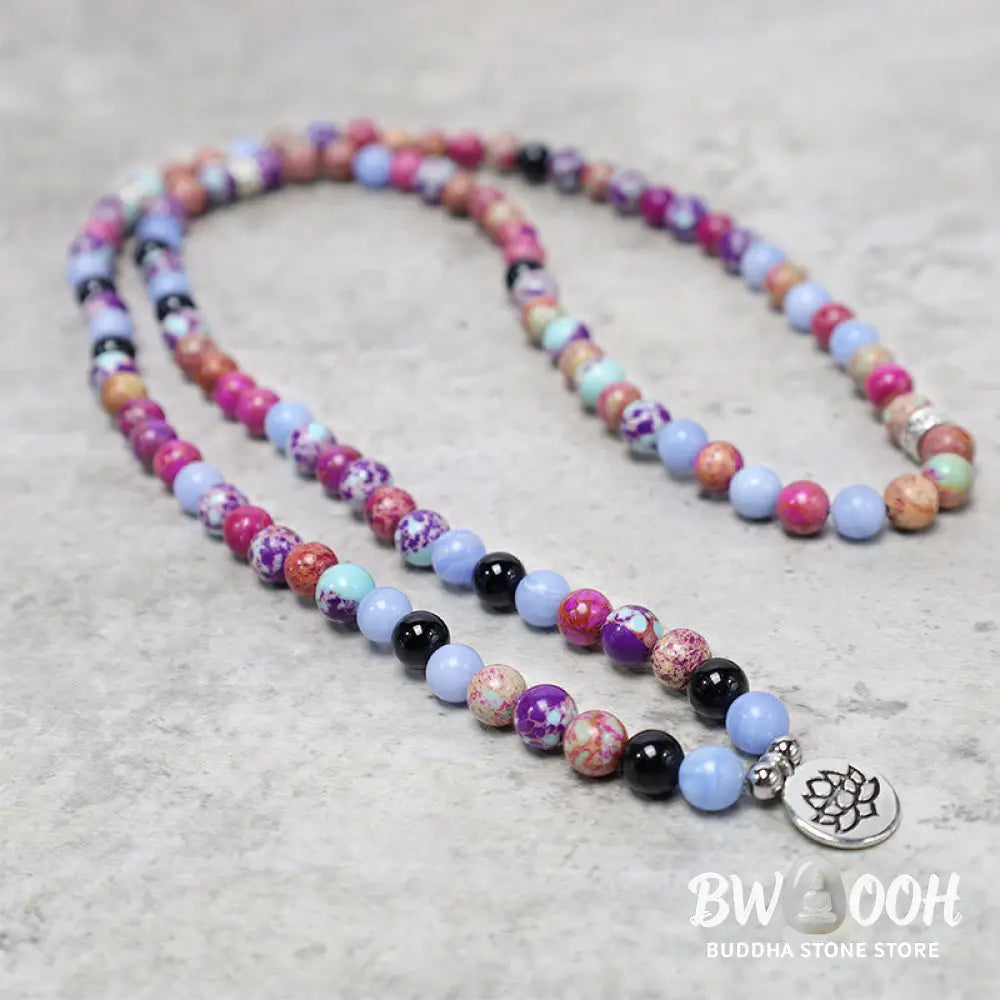 A BWOOOH Natural Purple Miano Real Stone Lotus Mala featuring 108 polished 8mm purple beads, a detailed Lotus symbol charm, and a guru bead, designed for mindful meditation and spiritual balance. The mala is 37 inches long, handcrafted for unisex wear. - View 3