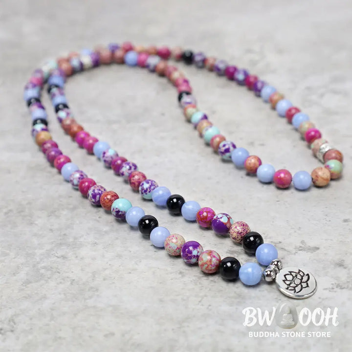 A BWOOOH Natural Purple Miano Real Stone Lotus Mala featuring 108 polished 8mm purple beads, a detailed Lotus symbol charm, and a guru bead, designed for mindful meditation and spiritual balance. The mala is 37 inches long, handcrafted for unisex wear. - View 3
