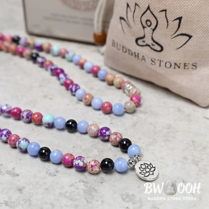 A BWOOOH Natural Purple Miano Real Stone Lotus Mala featuring 108 polished 8mm purple beads, a detailed Lotus symbol charm, and a guru bead, designed for mindful meditation and spiritual balance. The mala is 37 inches long, handcrafted for unisex wear. - View 8