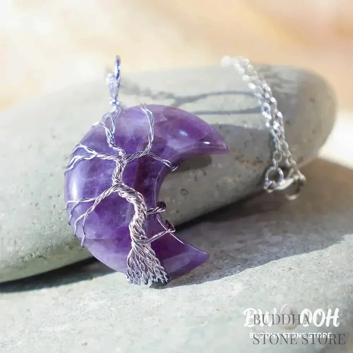 BWOOOH Natural Quartz Crystal Moon Tree of Life Healing Energy Necklace Pendant, crafted with a silver-wrapped Tree of Life design on a 32x47mm moon-shaped crystal, showcasing available materials like Amethyst or Rose Quartz. - View 3