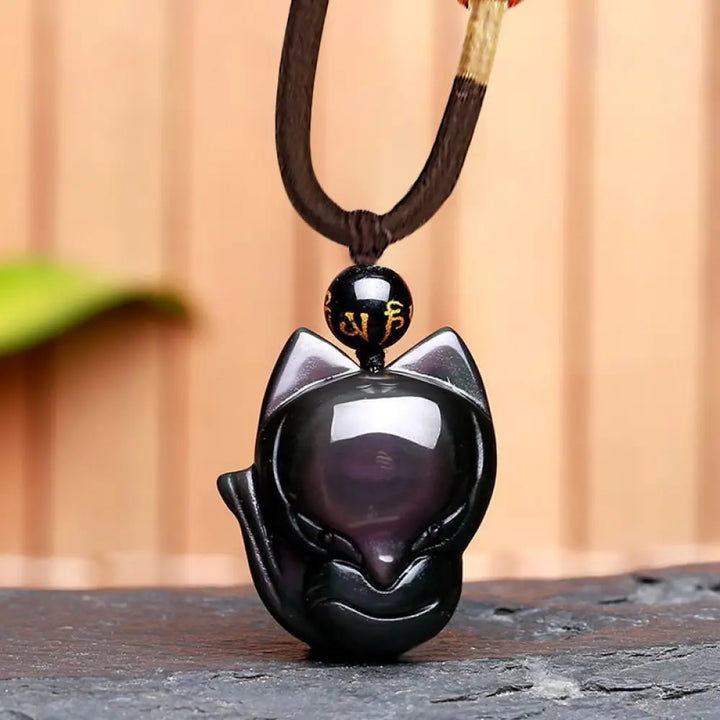 BWOOOH Rainbow &amp; Gold Sheen Obsidian Nine-Tailed Fox pendant. Iridescent colors, handcrafted natural gemstone symbolizing wisdom, protection from negativity, and attracting love for positive transformation. - View 12