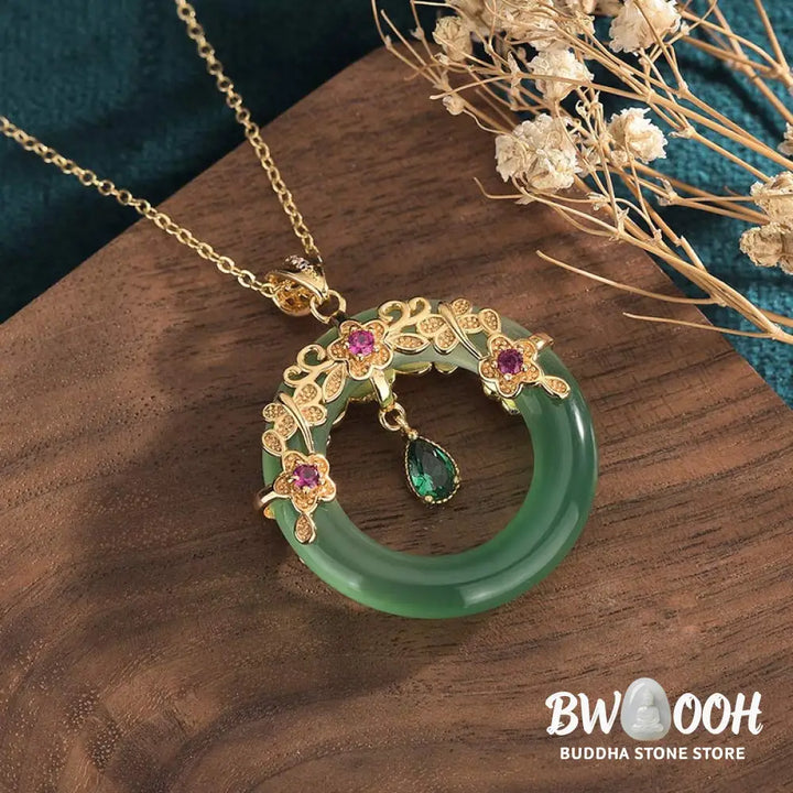 A BWOOOH Natural Round Cyan Jade Healing Necklace Pendant, 30x40mm, suspended on a 40-50cm chain, showcasing its serene blue-green hue, symbolic of success, harmony, and luck for spiritual wellness and mental clarity. - View 2