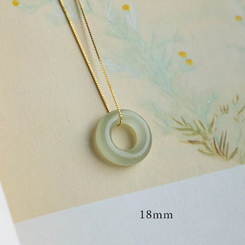 BWOOOH Natural Round Jade Peace Buckle Necklace featuring a polished green Jade disc, 40cm 925 sterling silver plated gold chain, symbolizing luck and abundance. - View 6