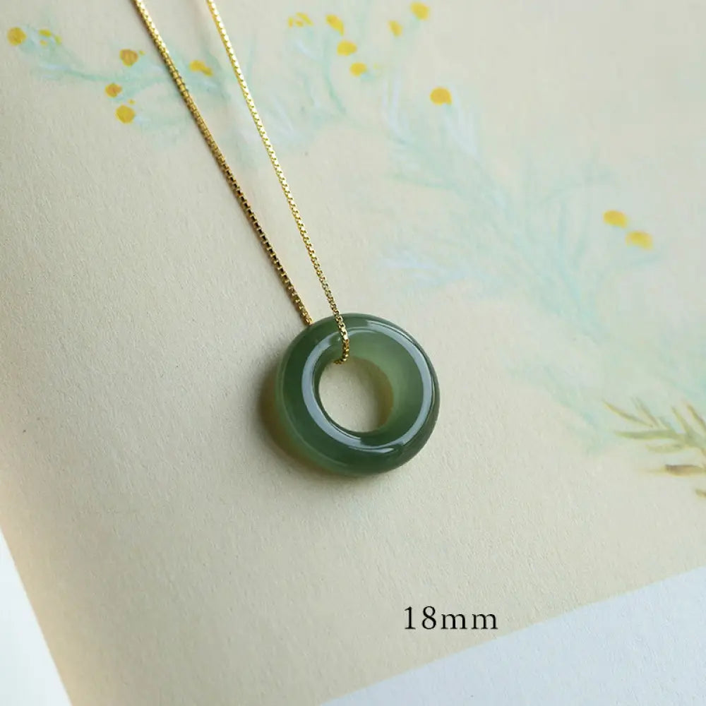 BWOOOH Natural Round Jade Peace Buckle Necklace featuring a polished green Jade disc, 40cm 925 sterling silver plated gold chain, symbolizing luck and abundance. - View 11