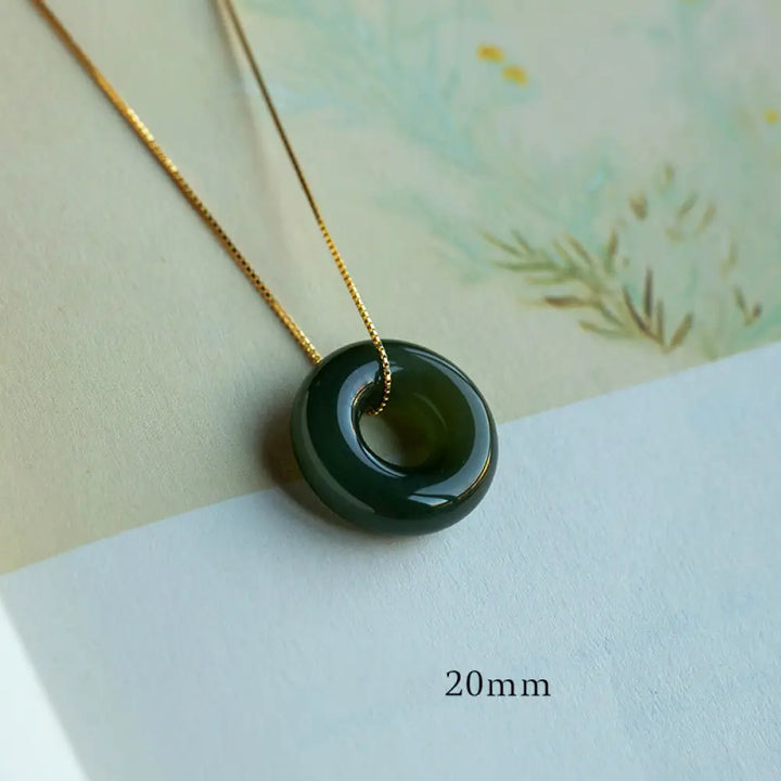 BWOOOH Natural Round Jade Peace Buckle Necklace featuring a polished green Jade disc, 40cm 925 sterling silver plated gold chain, symbolizing luck and abundance. - View 12