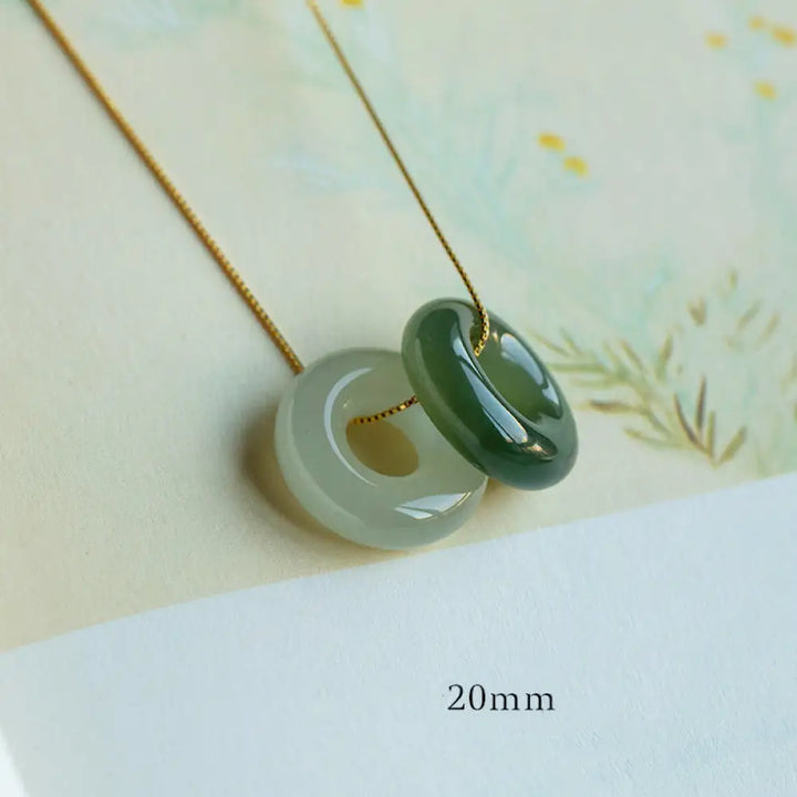 BWOOOH Natural Round Jade Peace Buckle Necklace featuring a polished green Jade disc, 40cm 925 sterling silver plated gold chain, symbolizing luck and abundance. - View 22