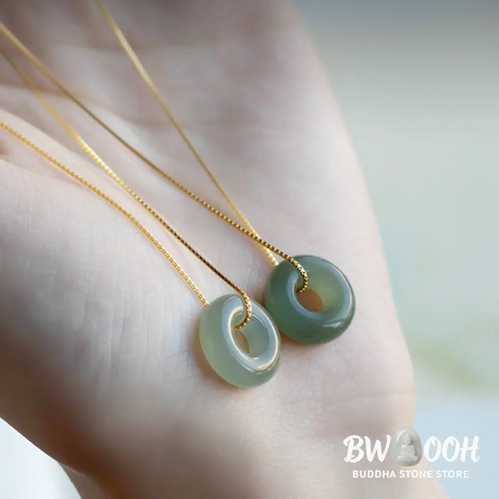 BWOOOH Natural Round Jade Peace Buckle Necklace featuring a polished green Jade disc, 40cm 925 sterling silver plated gold chain, symbolizing luck and abundance. - View 2