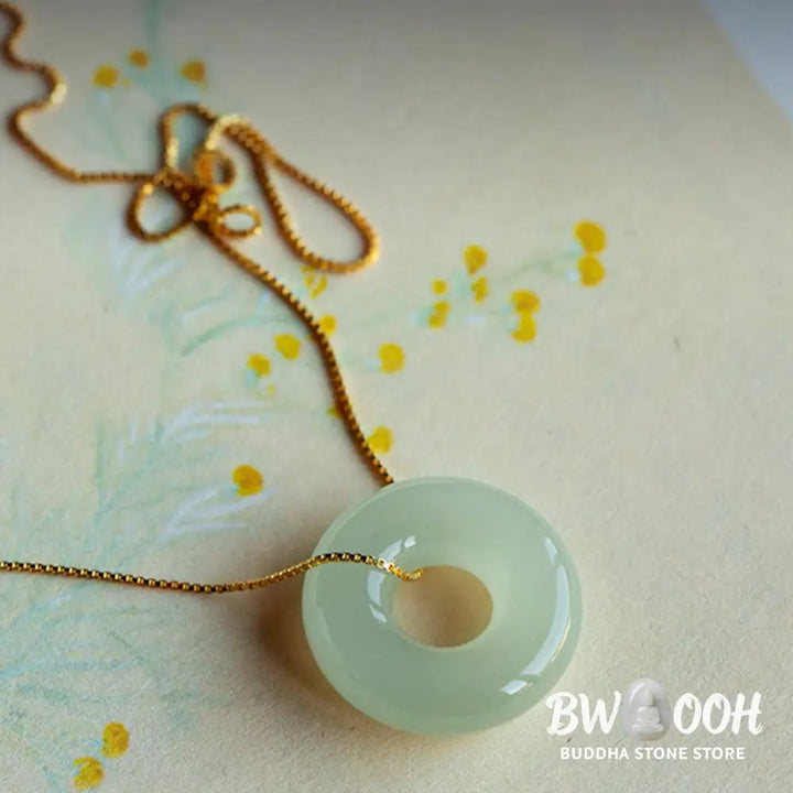 BWOOOH Natural Round Jade Peace Buckle Necklace featuring a polished green Jade disc, 40cm 925 sterling silver plated gold chain, symbolizing luck and abundance. - View 4