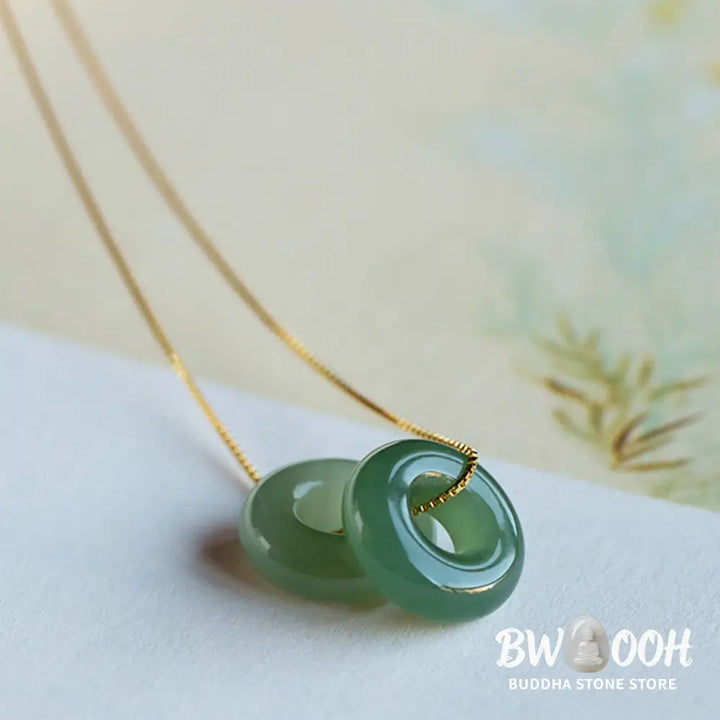 BWOOOH Natural Round Jade Peace Buckle Necklace featuring a polished green Jade disc, 40cm 925 sterling silver plated gold chain, symbolizing luck and abundance. - View 19