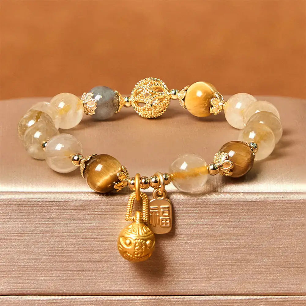 BWOOOH Natural Rutilated Quartz Fu Character Metal Swallowing Beast Auspiciousness Bracelet — Quartz crystal healing brace...