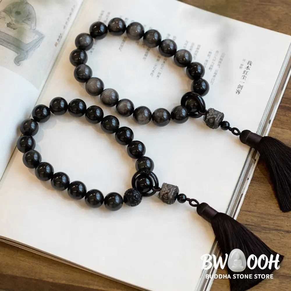 BWOOOH Natural Silver Sheen Obsidian and Black Obsidian Lion Wrist Mala with Tassels. 14mm/16mm beads, 16*15*15mm lion, for protection, courage, and positive Feng Shui energy. - View 15
