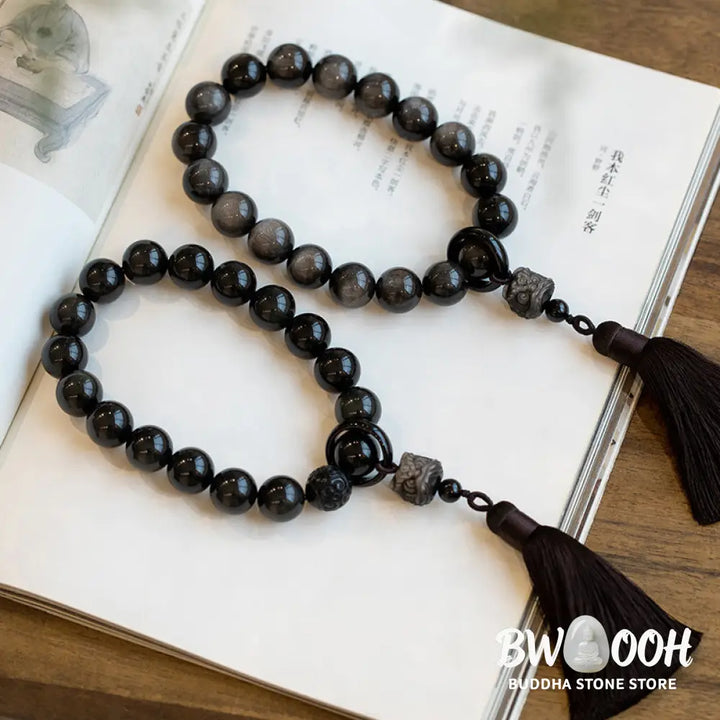 BWOOOH Natural Silver Sheen Obsidian and Black Obsidian Lion Wrist Mala with Tassels. 14mm/16mm beads, 16*15*15mm lion, for protection, courage, and positive Feng Shui energy. - View 15