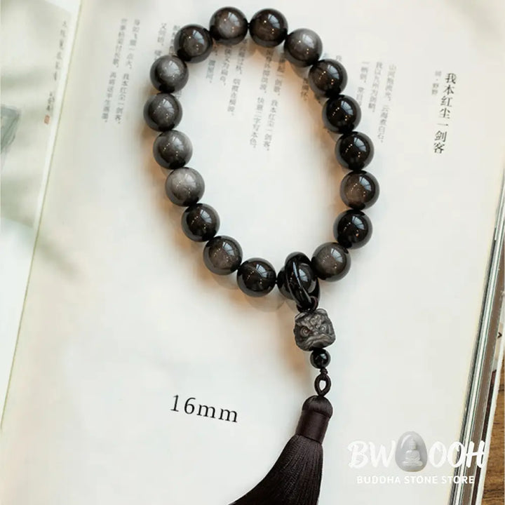 BWOOOH Natural Silver Sheen Obsidian and Black Obsidian Lion Wrist Mala with Tassels. 14mm/16mm beads, 16*15*15mm lion, for protection, courage, and positive Feng Shui energy. - View 11