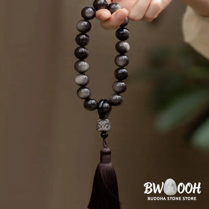 BWOOOH Natural Silver Sheen Obsidian and Black Obsidian Lion Wrist Mala with Tassels. 14mm/16mm beads, 16*15*15mm lion, for protection, courage, and positive Feng Shui energy. - View 8