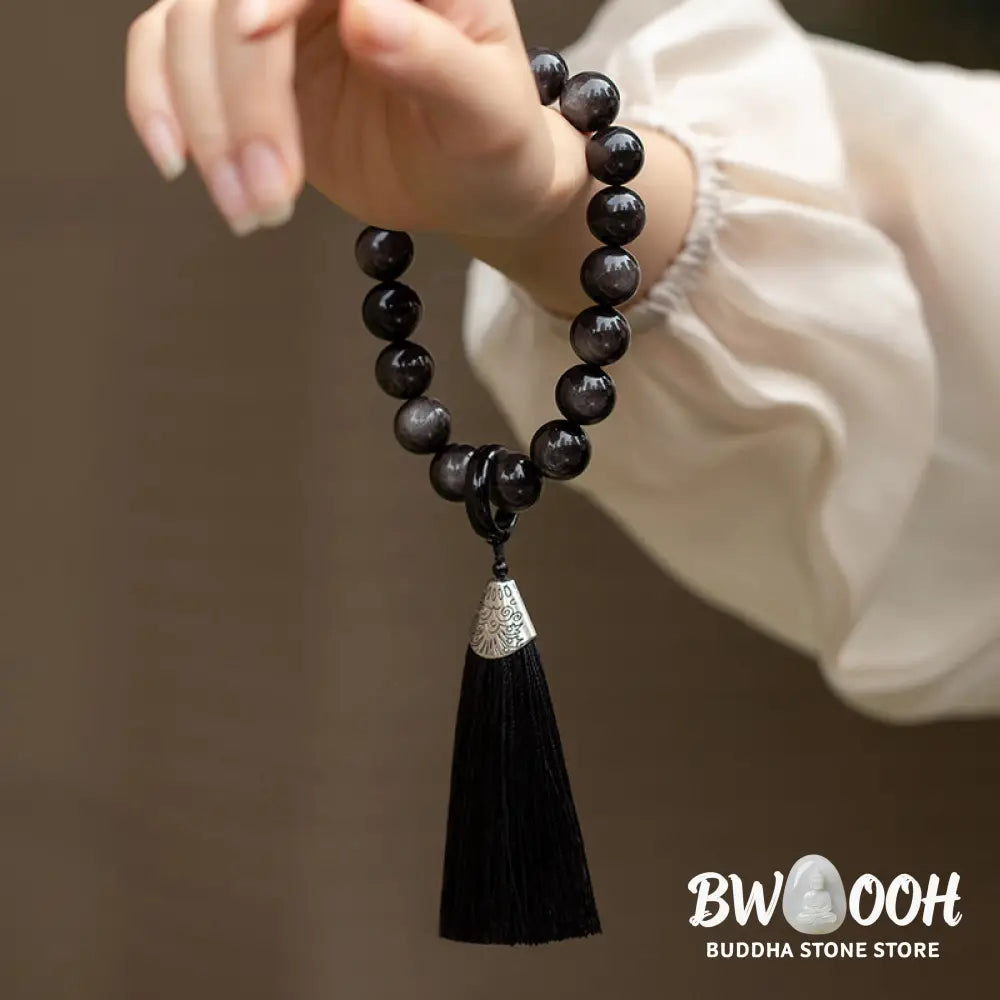 BWOOOH Natural Silver Sheen Obsidian and Black Obsidian Lion Wrist Mala with Tassels. 14mm/16mm beads, 16*15*15mm lion, for protection, courage, and positive Feng Shui energy. - View 3