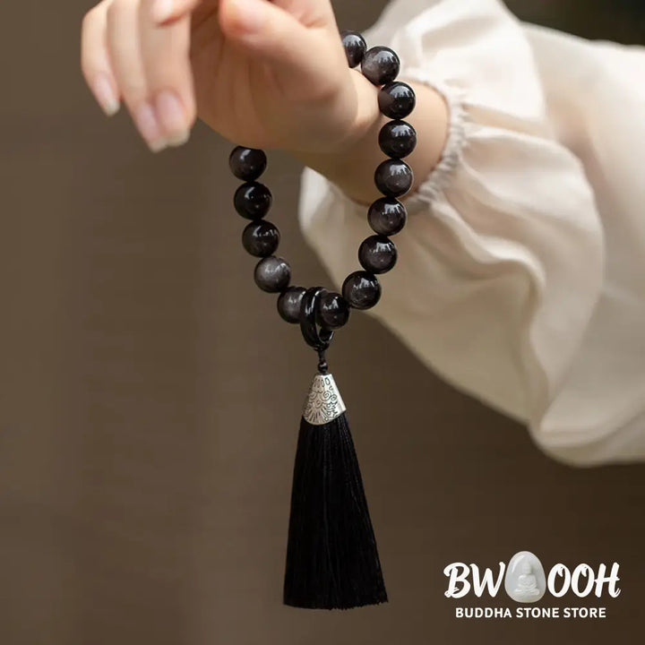 BWOOOH Natural Silver Sheen Obsidian and Black Obsidian Lion Wrist Mala with Tassels. 14mm/16mm beads, 16*15*15mm lion, for protection, courage, and positive Feng Shui energy. - View 3