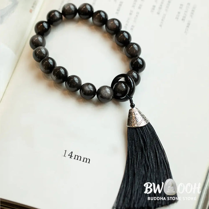 BWOOOH Natural Silver Sheen Obsidian and Black Obsidian Lion Wrist Mala with Tassels. 14mm/16mm beads, 16*15*15mm lion, for protection, courage, and positive Feng Shui energy. - View 5