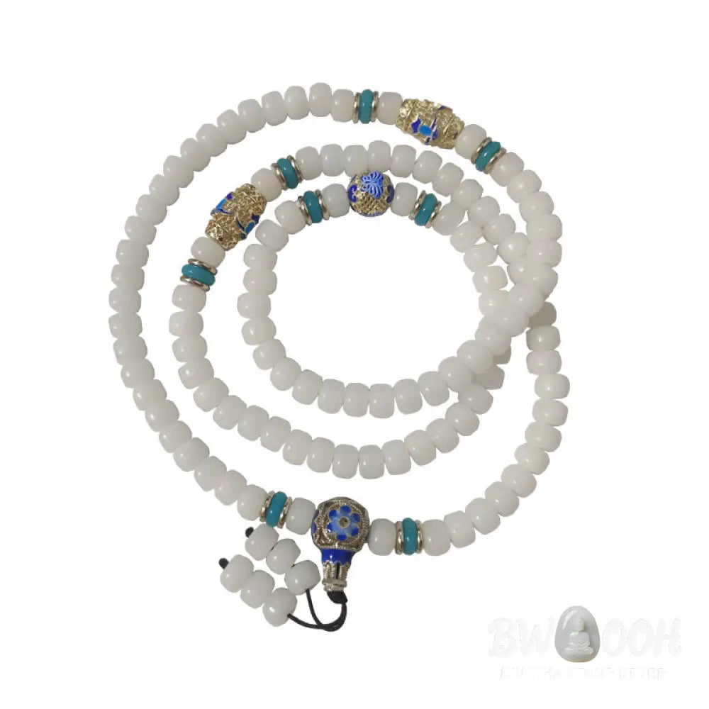 A BWOOOH Natural White Bodhi Seed Mala bracelet, featuring 108 dark-speckled beads, handmade for meditation, spiritual wisdom, and attracting wealth. Unisex design, worn on wrist. - View 4